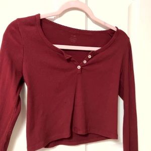 Brandy Melville long sleeve. Red ribbed texture w/ details on seems and buttons